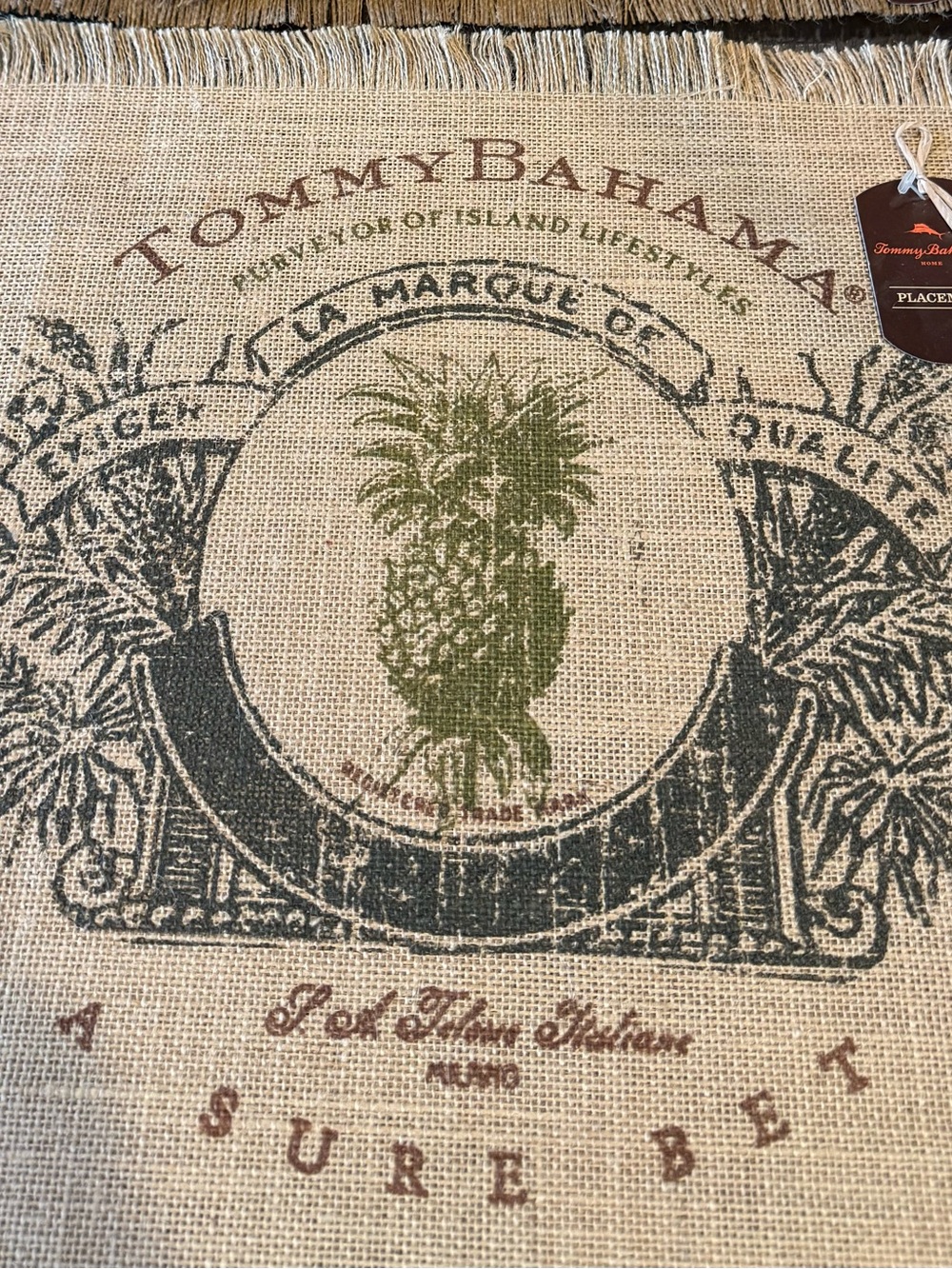 Tommy Bahama Natural Burlap Placemat with Green & Black Palm Emblem. Qty 4